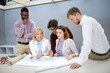 © Syda Productions - business team discussing house project at office
