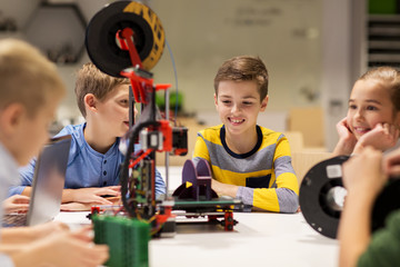 Wall Mural - happy children with 3d printer at robotics school