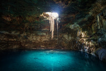 Sunbeams Penetrating In Opening Of Blue Cenote