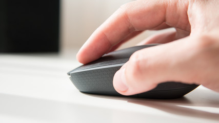 close-up of a computer mouse on a white background. Input device for computer. Shallow focus 