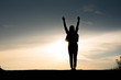 © stcom - Silhouette woman happy at sunset