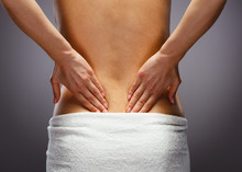 Woman Massaging Back Pain