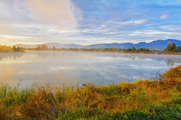 Wall Mural - Lake in the mountains for recreation and fishing. Early morning