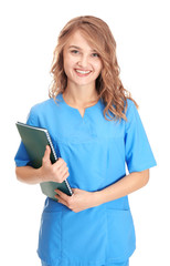 Wall Mural - Young beautiful doctor with notebook on white background