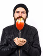 © be free - Brutal caucasian hipster holding alcoholic beverage or fresh cocktail