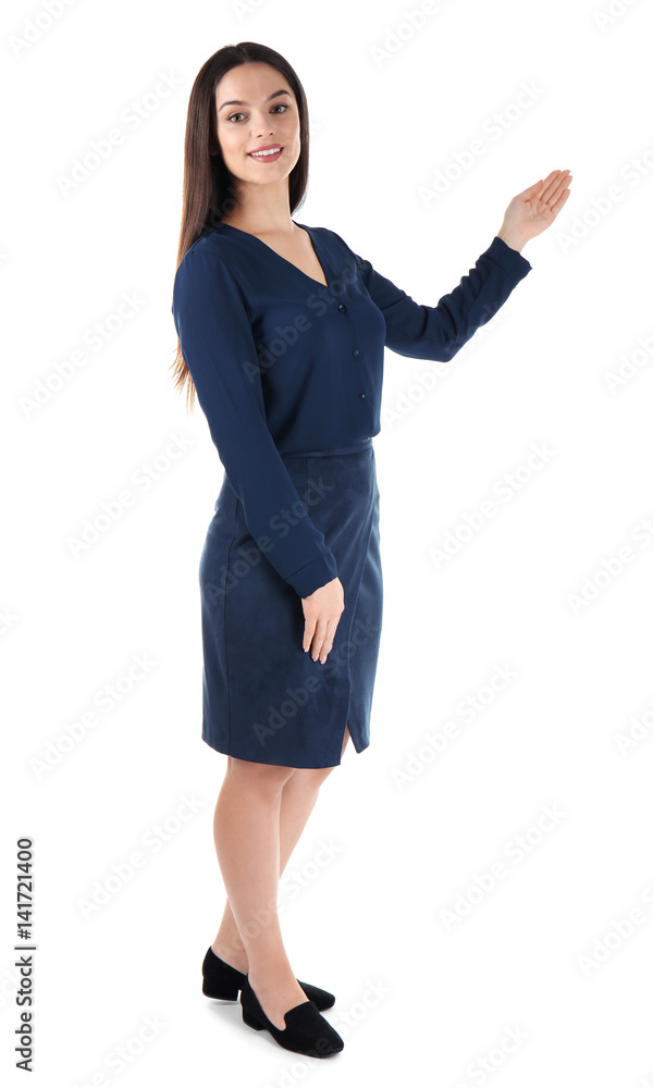 Beautiful young business woman standing on white background