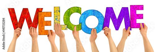 Photographie People holding up colorful letters shaping the word welcome concept background i