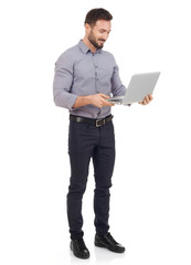 Cheerful man with laptop