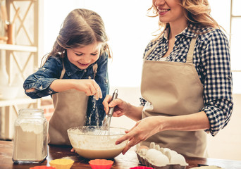 Mom and daughter baking