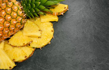 Pineapple On Stone Background With Copy Space