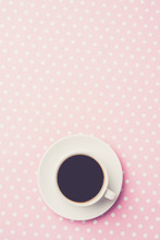 Coffee Cup On Pink Dotted Table