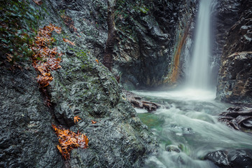 Mountain waterfall at fall