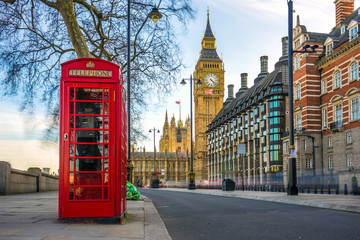 Poster - London, England - The iconic british old red telephone box with the Big Ben at background in the center of London