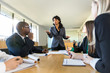 © elnariz - Business people attentive listening to marketing professional female executive speaker presentation