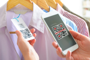 Woman scanning QR code