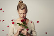© sanneberg - Beautiful woman with red rose petals, studio
