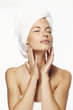 © sanneberg - Sensual woman in white towel, eyes closed