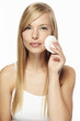 © sanneberg - Beautiful woman using cotton pad, portrait