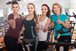 © caftor - Satisfied females of different age training on exercise bikes