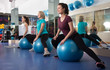 © caftor - Different age women jumping on exercise ball