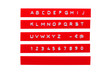 © nikkytok - embossed alphabet on red plastic tape, isolated on white