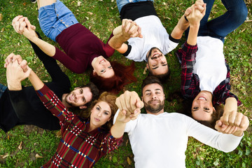 Wall Mural - Group of young people together outdoors in urban background