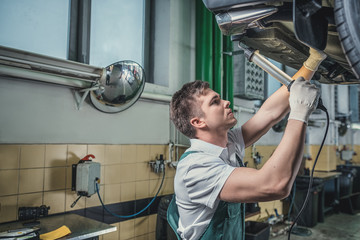 Wall Mural - Young mechanic