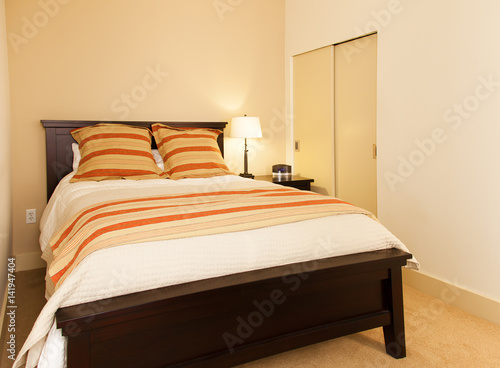 Small Space Modern Bedroom With Orange Accents Buy This