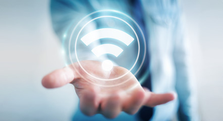 Poster - Businessman using free wifi hotspot interface 3D rendering