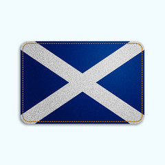 Canvas Print - National flag of Scotland with denim texture and orange seam. Realistic image of a tissue made in vector illustration.