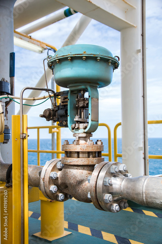 Fotografia, Obraz Control valve,Pneumatic operate valve by PLC control at offshore oil and gas c