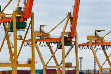 Wall Mural - Yellow cargo cranes in the port of Riga, Europe