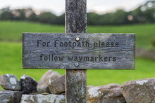 Sign: "For Footpath Please Follow Waymarkers", Seen In The Yorkshire Dales Near Bainbridge, North Yorkshire, UK