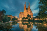Fototapeta  - Barcelona, Catalonia, Spain: Basicila and Expiatory Church of the Holy Family, known as Sagrada Familia at sunset 
