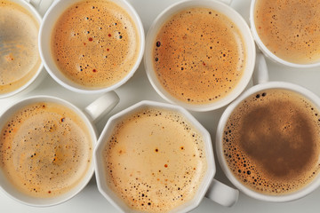 Poster - Cups of coffee on white background