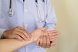 © 88studio - Doctor hands feeling pulse on female wrist