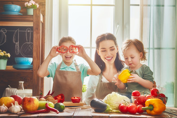 Wall Mural - Happy family in the kitchen.