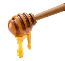 Honey Dripping Isolated On A White Background