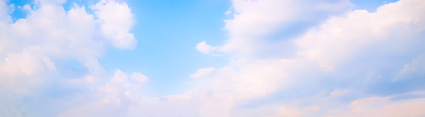 Wall Mural - sky background. nature composition. panoramic sunset sky background. bright blue sky with lighted cl