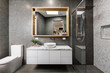 Modern designer bathroom with herringbone shower tiling