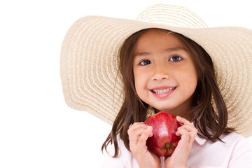 Wall Mural - cute little girl, hand holding red apple