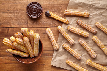 Wall Mural - churros traditional spain culture breakfast or lunch sweet dough dessert baked pastry street fast fo