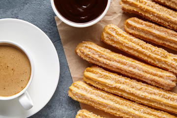 Wall Mural - churros spain or mexican breakfast meal street fast food dessert with cup of coffee and chocolate di
