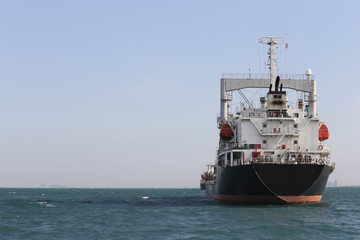 Wall Mural - Marine cargo ship in sea.