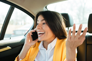 Sticker - Close up portrait of a young female executive on phone