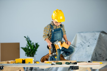 Wall Mural - Little boy with tools