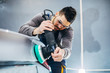 © bernardbodo - Polishing car with the machine