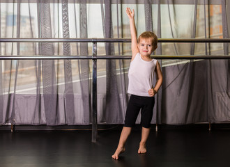 Little boy dancer in a dance studio