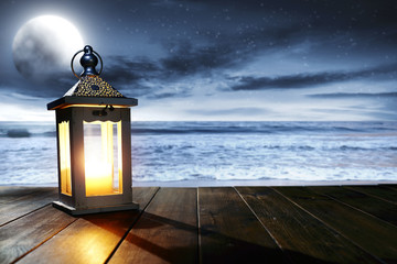 Wall Mural - lamp and sea at night 