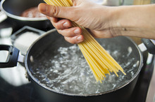 Cooking Spaghetti In A Pot With Boiling Water